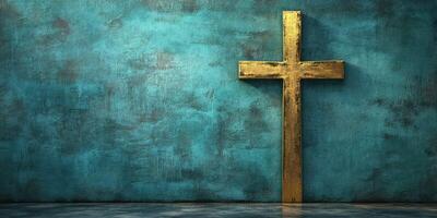 Golden cross stands against a textured turquoise wall in a serene and reflective indoor space photo