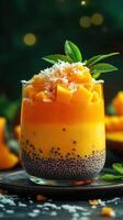 Delightful tropical dessert featuring mango, coconut, and chia seeds in a vibrant glass presentation photo