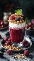 Colorful dessert featuring chia seeds, yogurt, and fresh berries served in a glass at a cozy cafe photo