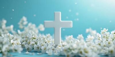 White cross surrounded by delicate white flowers on a soft blue background evokes tranquility and hope photo
