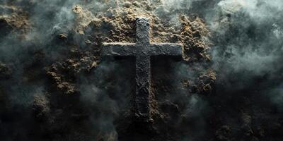 Cross emerging from dark earth surrounded by mist conveys a sense of mystery and reflection in a somber atmosphere photo