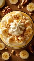 Delicious banana pudding dessert topped with whipped cream and crushed cookies at a cozy kitchen setting photo