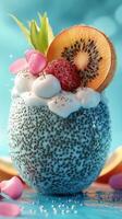 Delicious and colorful dessert featuring tropical fruits and creamy topping in a decorative bowl photo