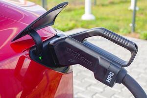 Vilnius, Lithuania, 2024 - Tesla's charging port CCS Type 1 photo