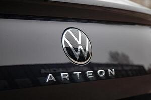 Vilnius, Lithuania, 2024 - Emblem, badge with logo and name of model on the trunk of Volkswagen Arteon photo