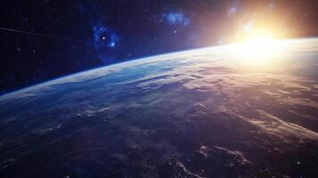 A beautiful view of the Earth from space. The blue and white colors of the planet are contrasted with the dark blue of the sky. The sun is shining brightly photo