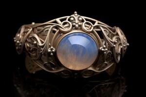 Vintage White Moon Stone in bronze Bracelet. Isolated on black background. photo