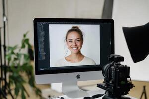 Smiling woman in a professional photography studio showcasing unique style and confidence photo