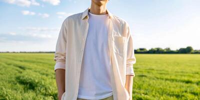Casual outfit on a person in an open field during daytime natural landscape full-body view peaceful environment photo