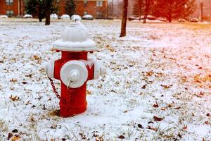Fire Hydrant in winter, on snow covered street. street hydrant winter snow photo