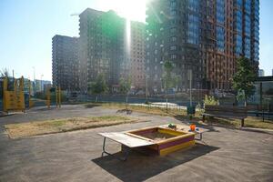 playground with a view of the houses under construction in the new district photo