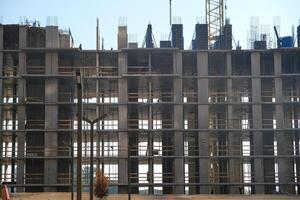 the foundation of a multi-storey building through which the sun's rays penetrate photo