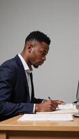 African American male student with educational environment as backdrop photo