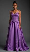 stylish retroinspired vintageromance fairytale image features an elegant African American teenager dressed in a dreamy purple gown and an updo hairstyle set against an abstract background photo
