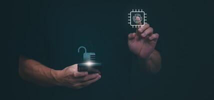 a man holding a smartphone with a fingerprint sensor and a lock icon photo