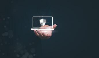 Person showing protection system In order to screen or prevent attacks from hackers, the concept of managing systems to be safe. digital transformation Internet of Things, Data Storage photo