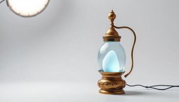 Glowing Blue Orb in Ornate Gold Snow Globe on White Background photo