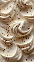 Whipped cream swirls topped with chocolate sprinkles create an appealing dessert decoration photo