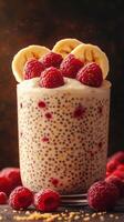 Creamy chia seed pudding topped with fresh raspberries and banana slices in a cozy setting photo