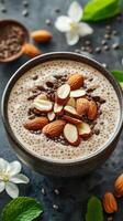 Nutritious chia seed pudding topped with almonds and coffee beans in an elegant bowl photo