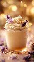 Rich vanilla cream topped with lavender flowers and golden honey in a rustic glass photo