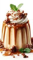Delicious dessert with creamy caramel sauce, whipped cream, and crunchy toppings served on a white background photo