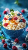 Delicious dessert bowl with rice pudding topped with fresh berries and edible flowers in a vibrant setting photo