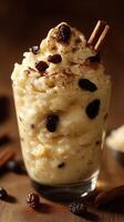 Creamy rice pudding with raisins and cinnamon in a glass dish perfect for winter gatherings photo