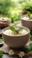 Delicious dessert served in a rustic bowl with mint and flowers, showcasing fresh ingredients and natural light photo