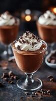 Decadent chocolate mousse dessert topped with whipped cream and chocolate shavings in an elegant setting photo