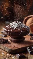 Delicious chocolate dessert topped with coconut flakes and chocolate shavings in a cozy setting photo
