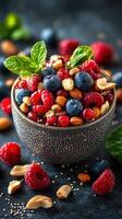 Freshly prepared berry and nut bowl served on a dark surface showcasing vibrant colors and textures photo
