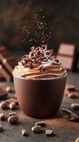 Decadent chocolate dessert topped with whipped cream and cocoa on a textured surface with chocolate pieces photo