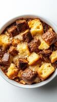 Delicious bread pudding baked to a golden perfection with layers of bread and sweet custard in a cozy kitchen setting photo