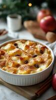 Delicious bread pudding topped with golden crust and raisins served in a cozy kitchen setting photo