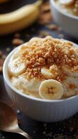 Delicious banana pudding topped with crushed cookies on a rustic table setting photo