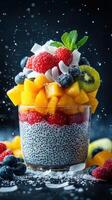 Vibrant fruit parfait with chia seeds and fresh berries served in a glass bowl photo
