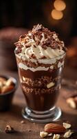 Indulgent chocolate dessert layered with cream and nuts served in a glass at a cozy cafe photo