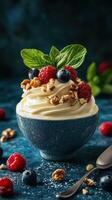 Delicious dessert bowl filled with creamy yogurt, fresh berries, and nuts in a stylish setting photo