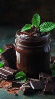 Rich chocolate spread garnished with fresh mint leaves on a dark background capturing a delightful dessert moment photo
