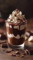 Creamy chocolate dessert topped with whipped cream and chocolate shavings in a rustic setting photo