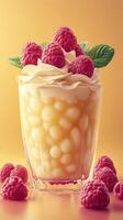 Delicious dessert featuring creamy layers topped with fresh raspberries against a warm background photo