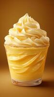 Creamy yellow dessert served in a glass dish with swirls of soft ice cream appealing to sweet lovers photo