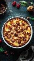 Delicious homemade dessert featuring a creamy filling and crunchy topping with fresh raspberries, walnuts, and pecans on a dark background photo