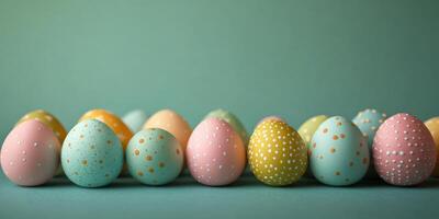 Colorful patterned Easter eggs lined up on a green background in springtime celebration decor photo