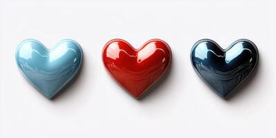 Decorative heart-shaped objects in blue, red, and dark colors arranged on a white background photo