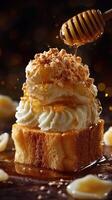 Indulgent dessert with whipped cream, honey drizzle, and crunchy topping served on a dark background photo