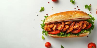 Delicious sandwich filled with crispy chicken, fresh lettuce, and tomatoes, perfect for a quick meal at any time photo