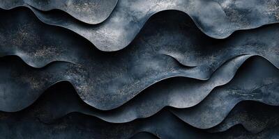 Waves of textured metal in dark tones create a dynamic pattern on a surface photo