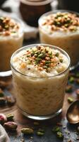 Creamy dessert topped with crushed nuts and pistachios in a cozy kitchen setting photo